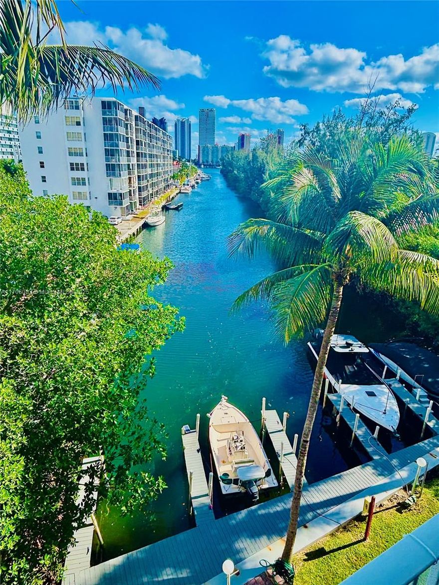 Ideal top-floor unit with Deeded Boat Dock. 3-bed, 2-bath condo with direct access to your private boat dock, complete with water and electric. Nestled on a deep canal with no fixed bridges, you’re just minutes from the Atlantic Ocean, Haulover Inlet, and Miami’s stunning blue waters & sandy beaches. This elegant home features a spacious open floor plan, modern finishes, and a 40-ft east-facing balcony with breathtaking canal and bay views. 12 unit Boutique Building means you will enjoy private amenities without the crowds: a private pool, tanning deck, gym, recreation room, two parking spaces, and storage. With the beach only moments away and the exciting $1.5B Uptown Harbour redevelopment next door, this rare gem offers luxurious living and incredible future potential. Don’t miss out!