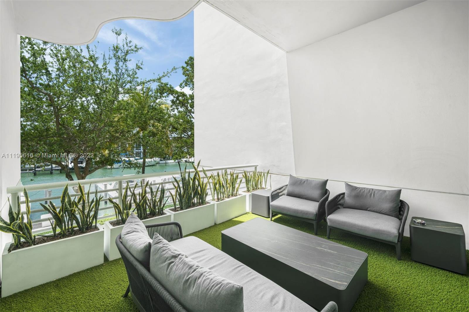 One-of-a-kind turn-key fully renovated waterfront home with private 41' boat slip included. The house is a modern 4 story townhome meticulously redesigned in exclusive, guard-gated Aqua at Allison Island. This 5 bedroom, 5.5 bathroom residence features 20’ ceilings, 3,810 interior SF, 3 terraces, private elevator, 2 car garage and water views. Gourmet Florense eat-in kitchen with double height ceilings, custom Tom Dixon lighting throughout. Elegantly furnished with a combination of Restoration Hardware Modern and boutique NYC designer touch, with all furniture available for purchase. Experience living at the coveted Aqua which offers two pools, spa and 6,000 SF fitness center, concierge, 24 hour valet and just blocks away from the ocean and Miami Beach’s finest dining and shopping.