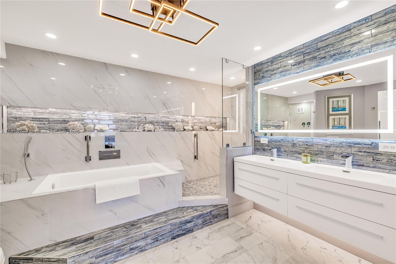 Meticulously reimagined and redesigned, this 17th-floor NW corner residence at Berkley South is the result of a recent, full-scale renovation. No surface untouched, no detail overlooked. The chef-inspired kitchen features imported Italian cabinetry, premium quartz surfaces, and a full suite of top-tier appliances. Smart home technology and Impact glass throughout. Retreat to the spa-like primary bathroom adorned with Artos fixtures, dual vanities, oversized shower, and refined finishes—your personal sanctuary in the sky. A flexible second bedroom opens to expand the living space with a built-in Murphy bed and sliding panels that offer flexibility for privacy or effortless conversion back into a fully enclosed bedroom. Offered fully furnished! Owner financing available.