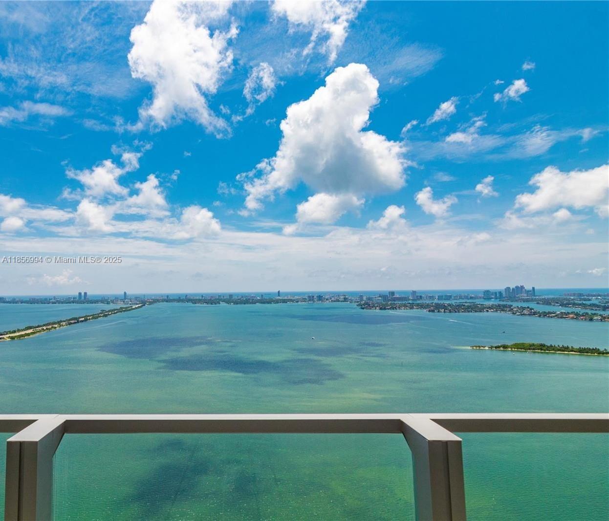 MIAMI LIVING! Enjoy the LOWER PENTHOUSE with extra high ceilings in this luxurious building. This spacious 2 bedroom + DEN and 3 bathroom boasts a private elevator that opens directly to your unit. Amazing water views from all rooms! Enjoy finished walk-in closets, gorgeous installed flooring, top of the line appliances, electric blackout shades. This unit was designed and finished by top interior designer. Biscayne Beach goes beyond the standard of luxury- 2 pools, cabanas, beach club with private beach for the building, state of the art gym, spa, tennis courts, dog park, and 24 hour concierge. Available for immediate occupancy!