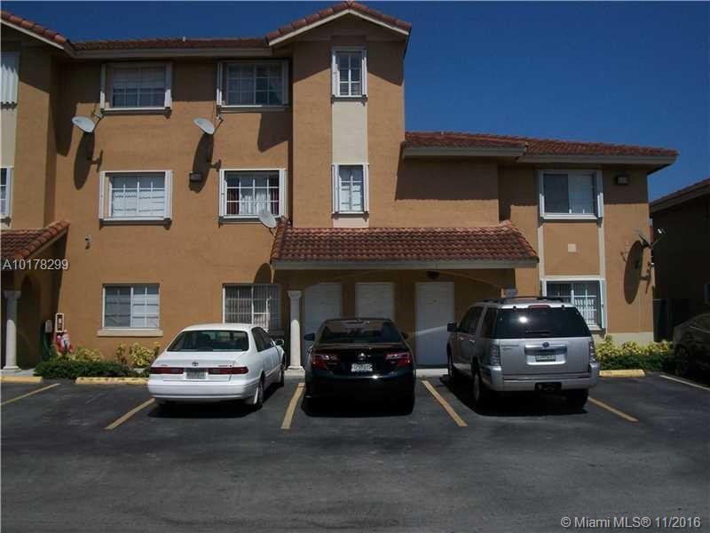 Beautiful and well kept 3 bedroom 2 bathroom villa/townhouse, one level, first floor, with 2 parking spaces directly in front of the unit. Spacious and comfortable floor plan. Huge master bedroom with a huge master walk-in-closet! Too many great features to name them all. Very Centric ally located, close to shopping malls, major highways and hospitals. This gem in Hialeah will sell fast! Brand new air conditioning system has just installed, inside and outside unit.