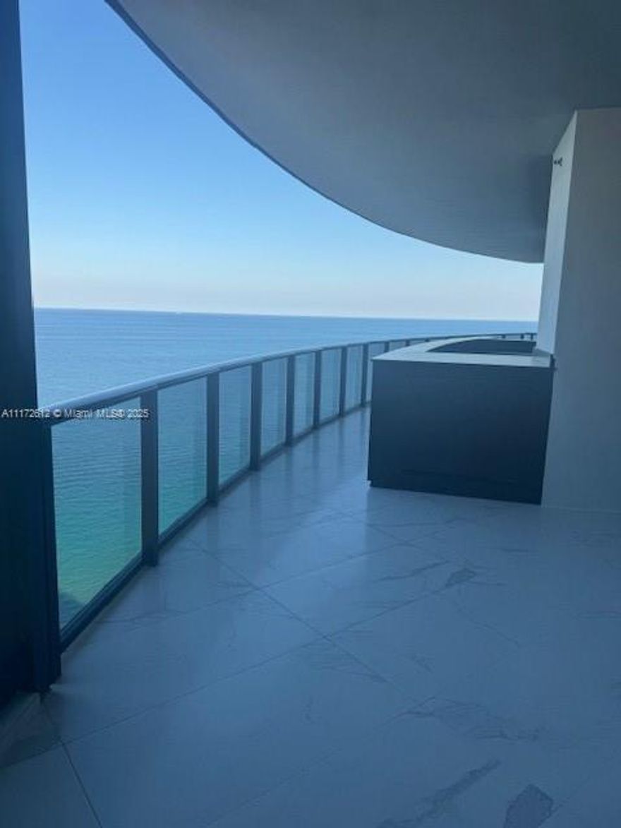 REDUCED!! Amazing Unit, Direct Ocean Front, 4bed/3bath+1hbath+plus service room with bath+ Den/Family room. Terrace with private pool & summer kitchen, private garage, robotic car elevator. Five starts amenities: gym, spa, beach service, private restaurant, theater, virtual games, race car simulator, lounge bar.
Garage is at the lower level (access with private stairs and private elevator) it is not at the kitchen level. Showing requests within 24 hs notice.