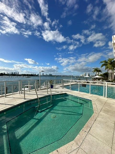 A superb unit!! Totally remodeled large (850 sq. ft) one bed room/ one bath room. Marble Floor throughout. Large balcony looking to the bay after the spacious living room. Brand new kitchen with stainless steel appliances, quartz counter top and numerous new white quality cabinets. Bath room with new large shower tiled all over. Convenient shelved walk in closet. Great amenities like Bay front pool, Barbeque area, hot tub, open air lobby, gym and on site café. assigned parking. Close from everywhere that makes Miami Beach: The beach, Lincoln Rd, Flamingo park tennis and pool. 15mn from Downtown Miami and 20 mn from the Intl Airport. Easy to show.