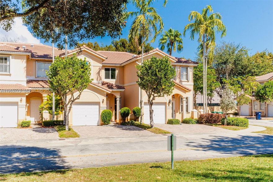 Welcome to this beautifully upgraded 3-bedroom, 2.5-bath townhome nestled in a quiet corner of the community in Kendall. This well-maintained residence offers privacy, modern upgrades, and an exceptional location within the neighborhood — with no neighbors behind and added privacy fencing for peace and comfort.

The home features an upgraded kitchen with wood cabinetry, soft-close drawers, stove, refrigerator, wine cooler, garbage disposal, under-sink water filtration system, and included washer and dryer. Crown molding and upgraded lighting are found throughout the home, along with tastefully updated bathrooms.

Additional improvements include a 3-year-old A/C system, tankless water heater, and impact windows and sliding glass doors — uniquely styled and the only ones of their kind in the entire community. The alarm system monthly payment is included in the HOA fee.

Enjoy a paved front porch, 1-car garage, and a private patio space perfect for relaxing or entertaining. The community is currently receiving a new roof and exterior painting, adding even more value and appeal.

Residents enjoy resort-style amenities including a clubhouse, three pools, gym, and two playgrounds.

Conveniently located near top-rated schools, shopping, dining, and major highways. This move-in ready townhome offers comfort, privacy, and modern upgrades in one of Kendall’s most desirable areas.

Schedule your private showing today!