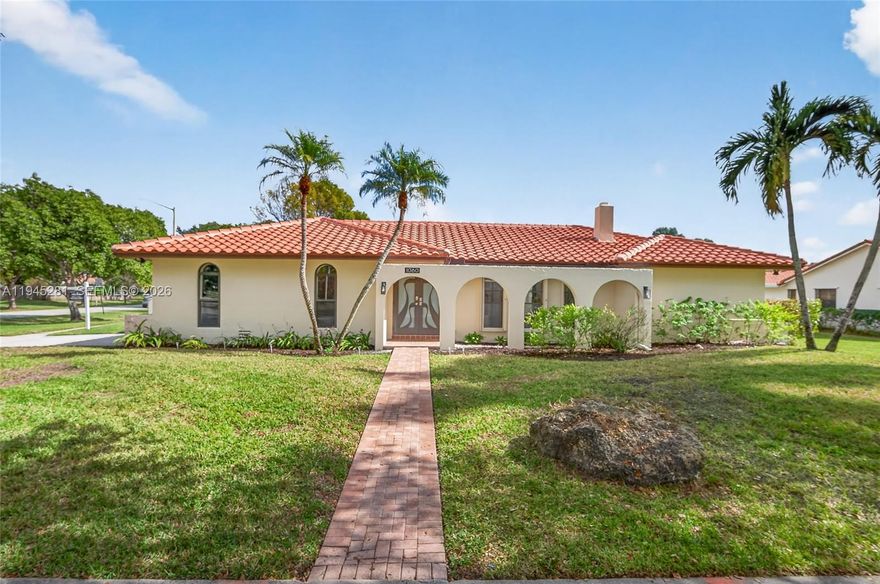 Rare Jacaranda Lakes lakefront on oversized corner lot, homes here rarely come to market. Spanish-style 4BR/2.5BA split plan with den/office offering exceptional privacy with only one neighboring home. Vaulted ceilings, formal living and dining rooms, spacious great room, and abundant natural light. Updated kitchen with granite counters, stainless appliances, and pass-through for indoor-outdoor entertaining. Updated baths, new carpet, impact windows and doors. Major upgrades include new roof and new A/C. Covered patio and screened pool overlook tranquil lake and expansive green space. Large 2-car garage. Prime Plantation location near parks, shopping, dining, and top schools. Move-in ready. Located less than 1/4 mile from Community Park with Pickleball, Tennis, and Basketball courts.