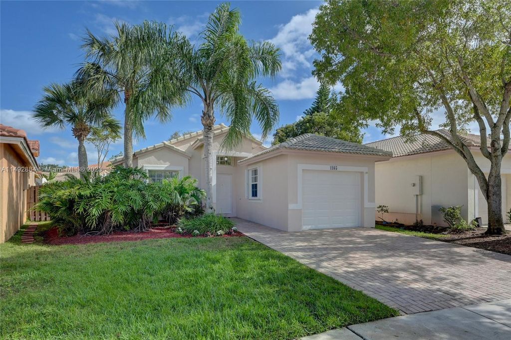 Photo of 1165 NW 171st Ter, Pembroke Pines, FL 33028 (MLS # A11492884)