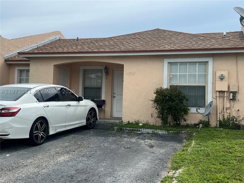 Photo of 20305 NW 27th Ct, Miami Gardens, FL 33056 (MLS # A11973611)