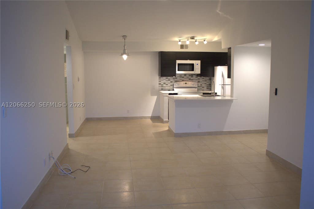 Photo of 2826 S University Dr #3203, Davie, FL 33328 (MLS # A12066250)
