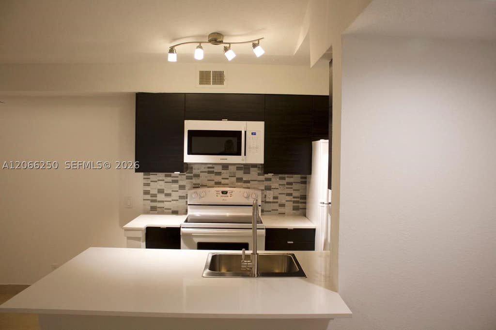 Photo of 2826 S University Dr #3203, Davie, FL 33328 (MLS # A12066250)