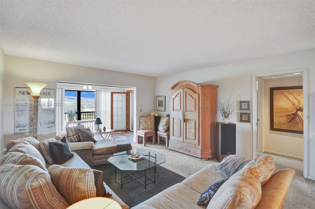 Photo of 2206 S Cypress Bend Dr #904, Pompano Beach, FL 33069 (MLS # A11415689)