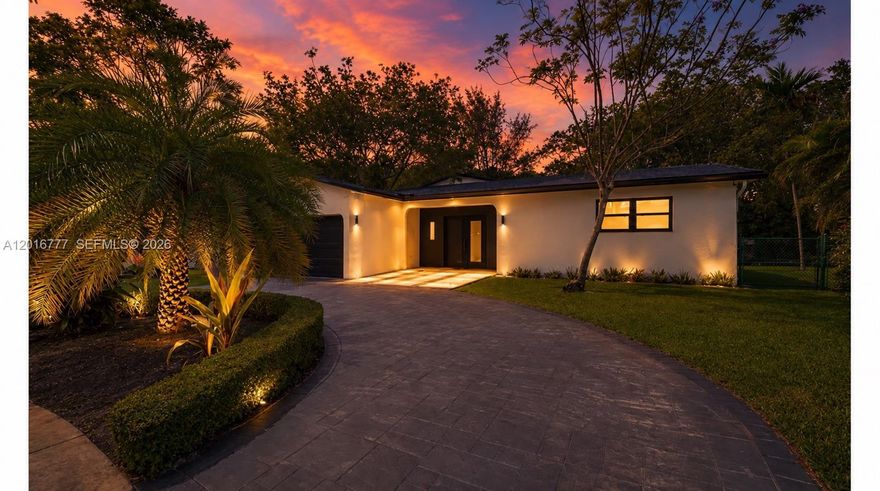 High-end fully remodeled two-story lakefront home in the desirable Hollywood Hills offering over 2,800 SqFt of luxury living. This stunning residence features 2 oversized primary suites, including a duplex-style suite with a custom walk-in closet and private balcony overlooking the garden and lake. Bright and open living spaces showcase elegant Italian flooring throughout, abundant closet space, and a designer Italian kitchen with custom cabinetry, expanded countertop space, and premium finishes perfect for entertaining. Major upgrades include new electrical, plumbing, central A/C, and hurricane impact windows and doors. Step outside to a beautifully landscaped oversized side and backyard filled with mature fruit trees and tropical plants, with plenty of room for a future pool. Complete pool plans and ready-to-install pool contract available upon request. Ideally located minutes from the beach, TY Park, I-95, shopping, restaurants, supermarkets. A rare move-in-ready luxury lakefront opportunity in Hollywood Hills. Backyard/Pool images have been virtually staged.