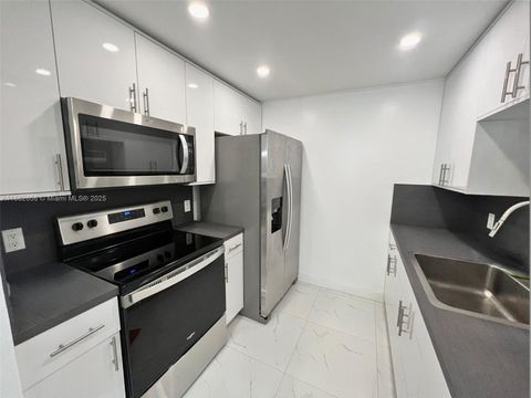 Photo of 200 SW 132nd Way #203L, Pembroke Pines, FL 33027 (MLS # A11882658)
