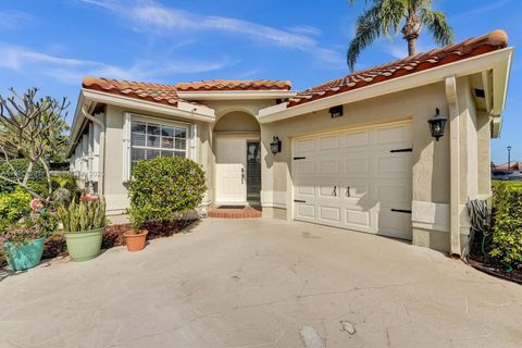 Photo of 6081 Bluegrass Dr, Boynton Beach, FL 33437 (MLS # A11922422)