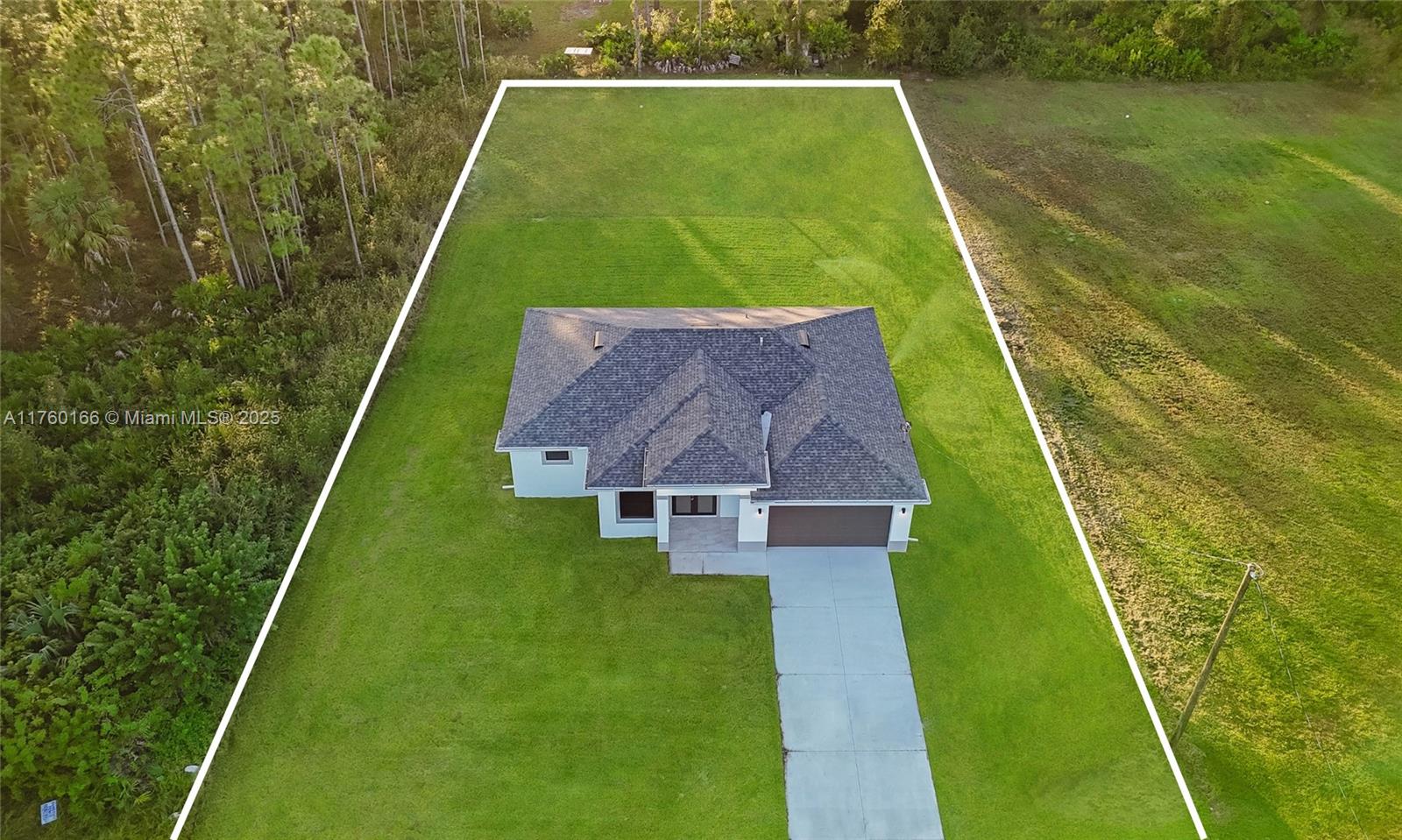 Property for Sale at 913 Palmetto Ave, Lehigh Acres, Lee County, Florida - Bedrooms: 3 
Bathrooms: 3  - $384,900