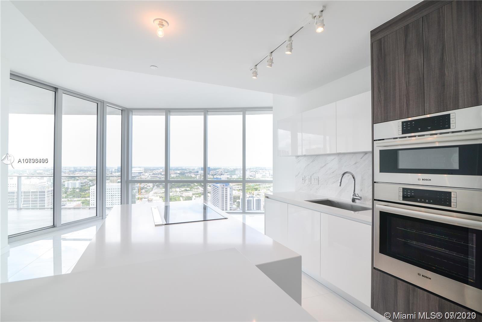 Welcome to this stunning 1bed plus den with two full bath condo with private elevator and foyer at Paramount Miami World Centre. Features include: 10 ft high ceilings, floor to ceiling windows, state of the art kitchen with Bosch and Sub Zero appliances, white tile floors, custom closets, black out blinds and more. Have access to amazing amenities including boxing, soccer, state of the art gym, 3 pools, basketball and more.