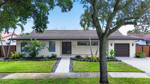Photo of 7020 Bamboo St, Miami Lakes, FL 33014 (MLS # A12101320)