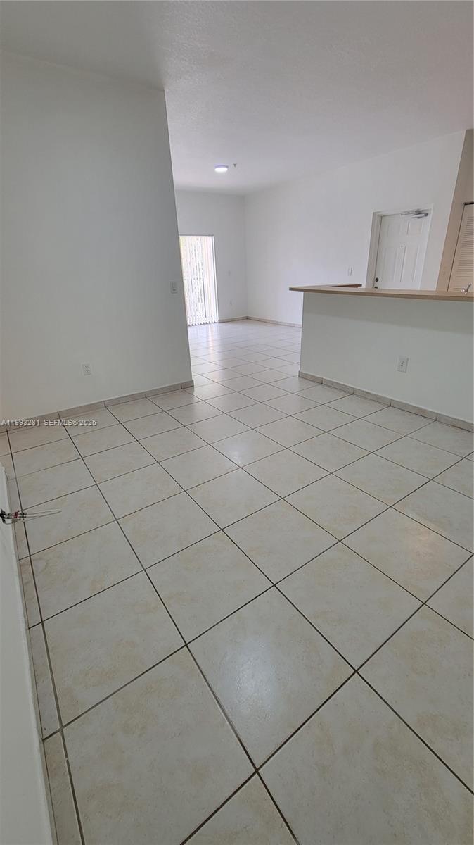PALM GARDENS AT DORAL CON - Residential Lease