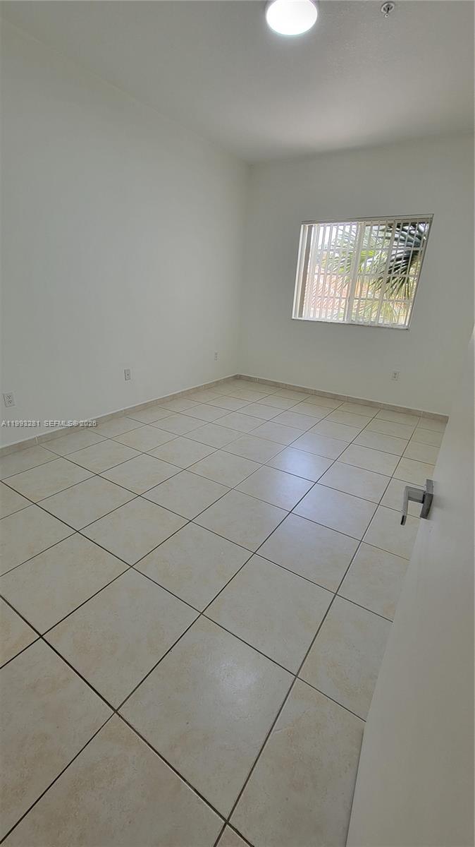 PALM GARDENS AT DORAL CON - Residential Lease