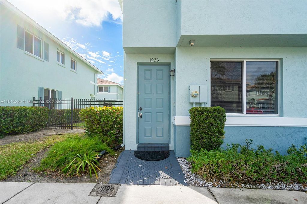 Photo of 1933 Gardenia Ct #1933, Riviera Beach, FL 33404 (MLS # A11515229)