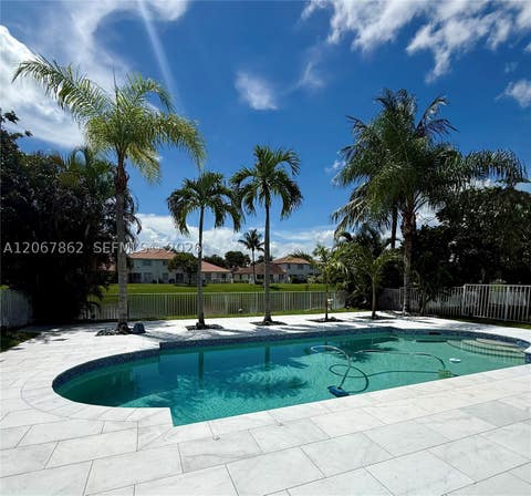 Photo of 1800 NW 78th Ave, Pembroke Pines, FL 33024 (MLS # A12067862)