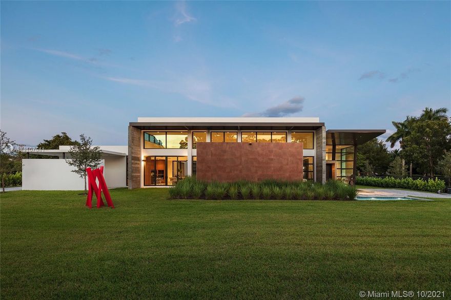 Stunning brand-new modern masterpiece built w/the finest finishes & welcoming you w/multiple water features, huge wd pivoting dr, foyer, flr to ceiling imp win & drs, & 18ft volume ceilings. Discover a one-of-a-kind open flr plan offering panoramic views from great rm & a walk-in glass wine cellar. Chef’s kit w/Italian style cabinets, quartzite counters & Wolf & SubZero appl. This elegant smart home has it all w/state-of-the-art video & surround sound, media rm, & office. Lavish master ste w/boutique style walk-in closet, sitting area, spa bath w/floating tub, 2 showers, steam rm & private patio. Find an extravagant 75’x15’ pool & spa w/tanning ledge, covered terr & summer kit. Other Feat: maids rm, carport & 3 car gar w/space for lifts. 1 acre lot available next dr.