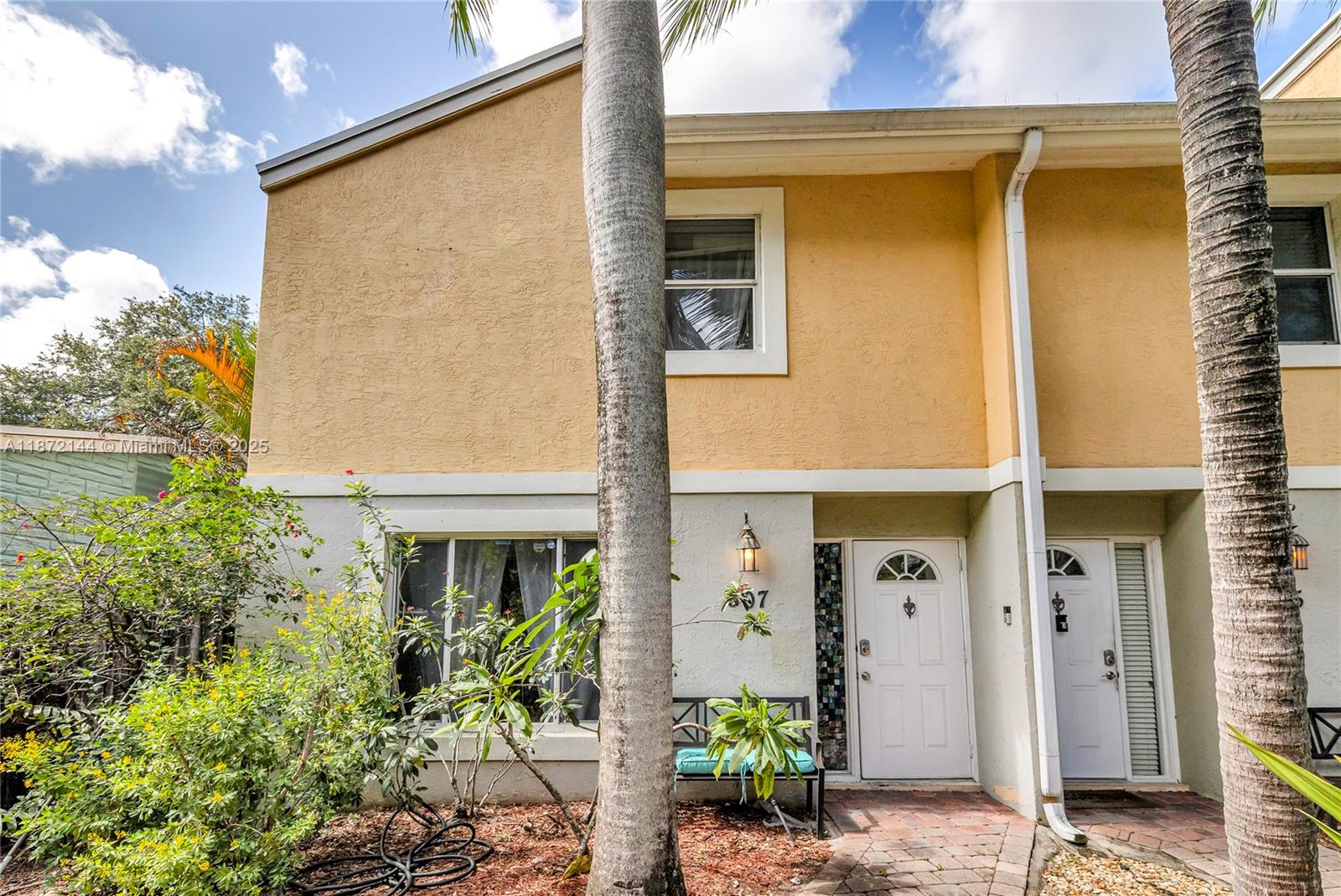 Downtown Fort Lauderdale Oasis!! Short Term 6-12 Month Lease Available-Unfurnished. Immaculate Move In Ready 2 Bedroom-1.5 Bath End Unit Townhome w/Sparkling Pool! Generous & Bright Living Space, 1/2 Bath First Floor, Open Kitchen w/Stainless Appliances, Dining Area. Both Spacious Bedrooms Located on Second Floor w/ Balcony & Full Bathroom. Laminate & Tile Flooring Throughout. Backyard Oasis Offering Private Patio Area W/ Electric For Lights 7 TV In Backyard w/Grill. Fully Fenced Yard. Resort Size Pool Shared w/One Lovely Tenant Next Door. Washer & Dryer. Only 3 Mile Bike or Golf Cart Ride to Ocean, Minutes to FLL Airport & Las Olas Blvd, Shopping, Dining, and More!! Pool & Lawn Care Included in Rent. Local Landlord, Quick Approval.