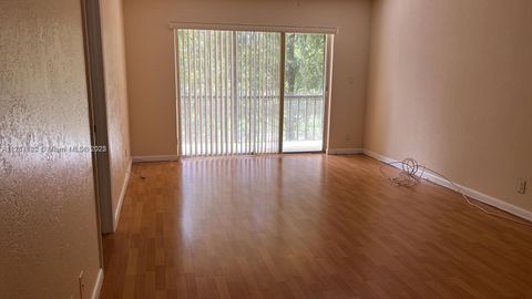 Photo of 8060 Fairview Dr #208, Tamarac, FL 33321 (MLS # A11767660)