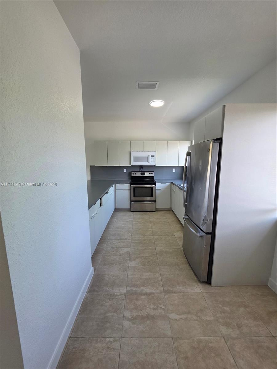 10233 SW 176th St .
