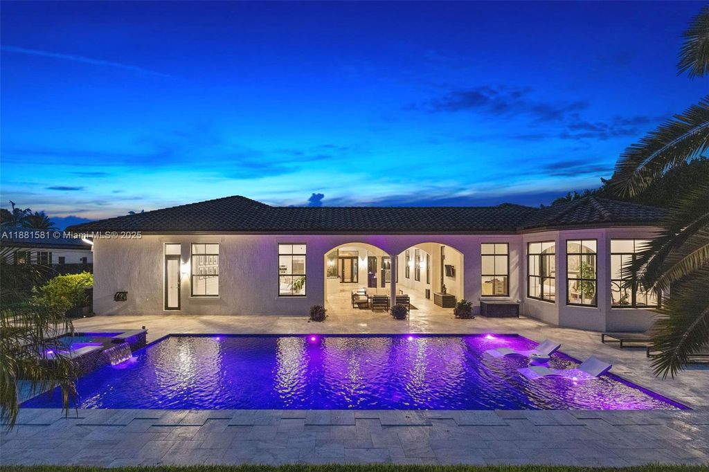 Photo of 10501 N Camelot Cir, Davie, FL 33328 (MLS # A11881581)