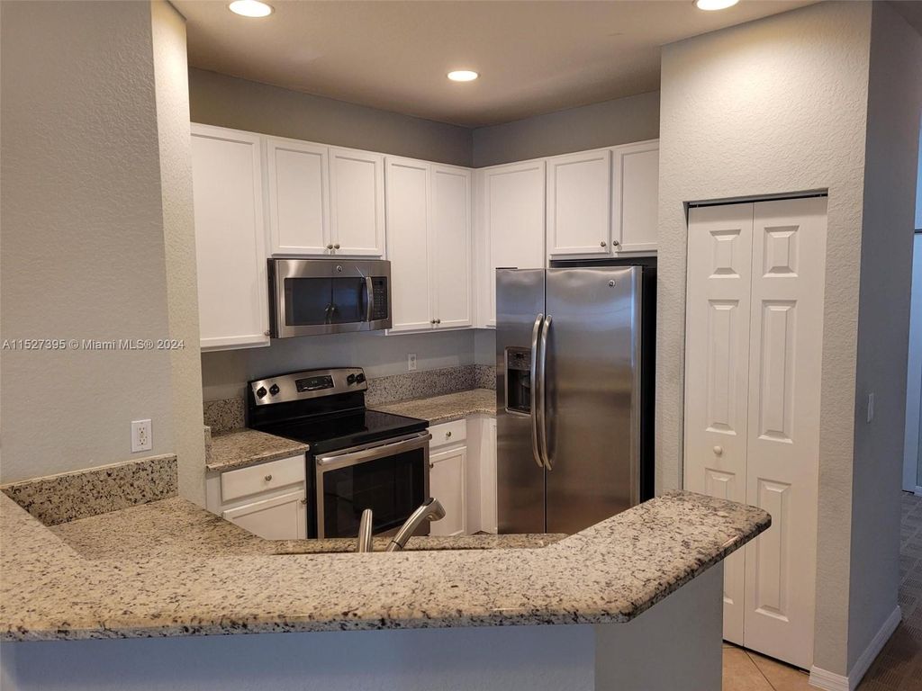 Photo of 108 W Pigeon Plum Dr #201, Jupiter, FL 33458 (MLS # A11527395)