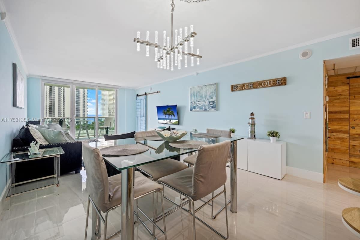This completely remodeled unit is ideally located just across from the beach, offering stunning views and easy access to the shoreline. With no rental restrictions, it’s perfect for investors looking to capitalize on the desirable location. Whether you're seeking a vacation rental or long-term investment, this property offers incredible potential. Don’t miss the chance to own a piece of paradise in a prime location!