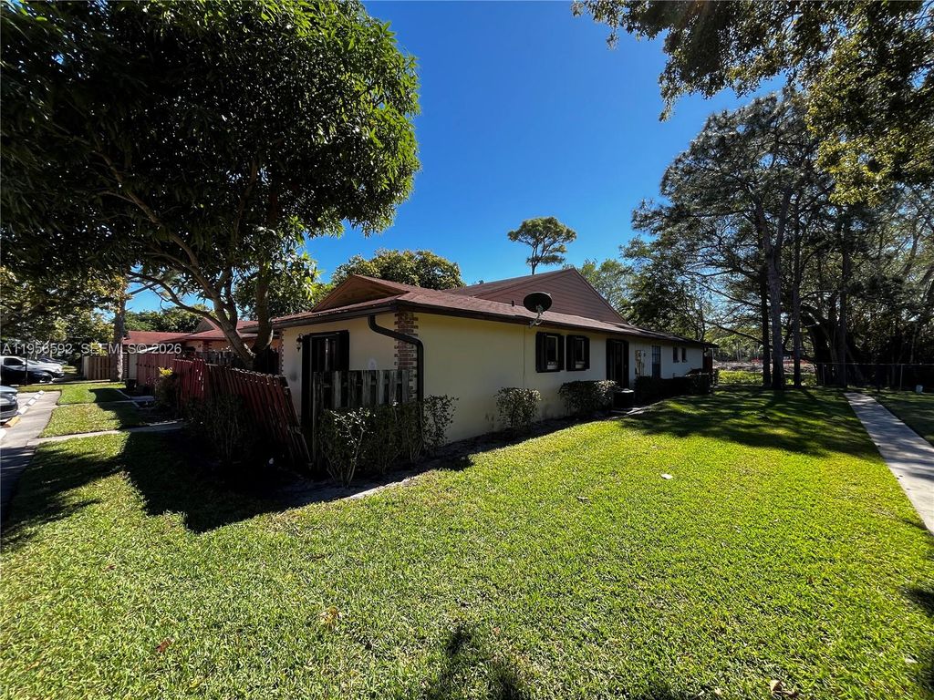 Photo of 4296 Woodstock Dr #A, West Palm Beach, FL 33409 (MLS # A11956592)