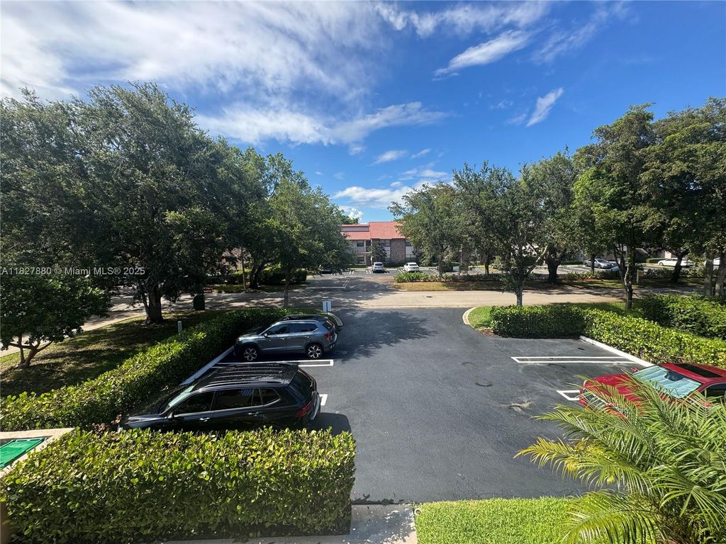 Photo of 11604 NW 45th St #4, Coral Springs, FL 33065 (MLS # A11827880)