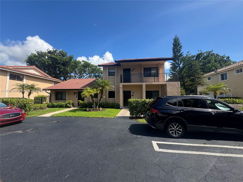 Photo of 11604 NW 45th St #4, Coral Springs, FL 33065 (MLS # A11827880)