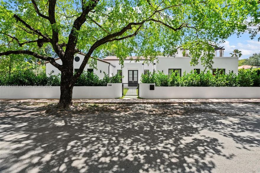A true Coral Gables masterpiece inspired by classic Italian villas. This brand-new 5 BD, 5.5 BA estate features Italian wood floors, a dramatic Ocean Travertine staircase, Italian custom cabinetry and millwork, and Italian doors. The Italian gourmet kitchen showcases stone-covered cabinets and walls with Wolf/Sub-Zero appliances. Natural light, soaring ceilings, and open flow elevate the design. Outdoors, enjoy a 70-ft saltwater heated pool and a stunning Taj Mahal stone summer kitchen with a luxury Lynx grill. Bathrooms feature natural stone floors and countertops. Laundry room downstairs plus extra upstairs. Situated on an oversized lot in the lowest flood zone, steps from Granada Golf Club, top schools, and Miracle Mile.  Opportunities like this are truly rare!