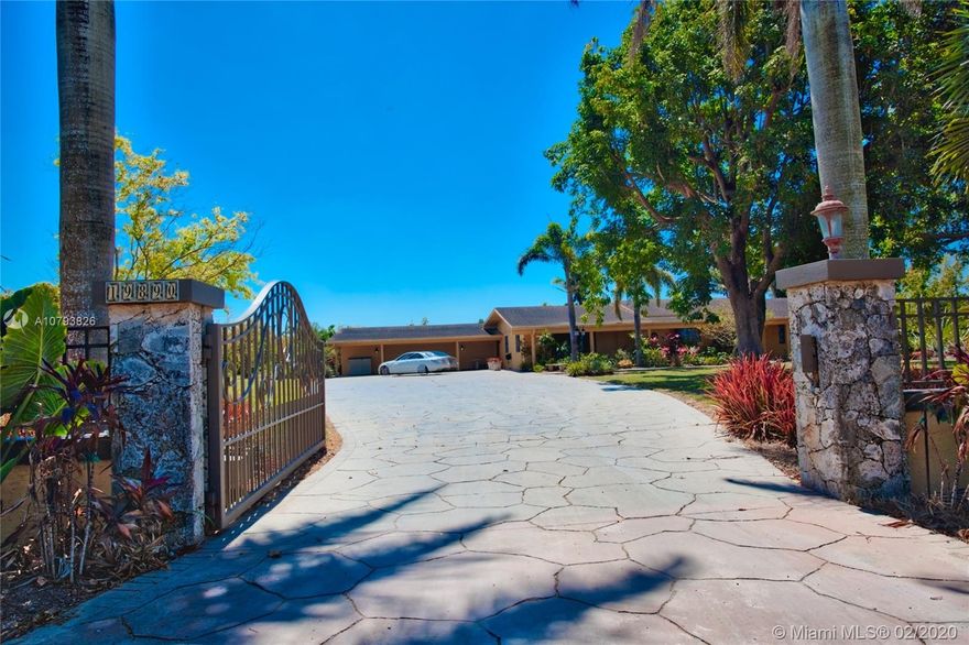 Beautiful estate home in the Redlands: 5 bedrooms, 3.5 Bathrooms, 2-bedroom guest house, and gorgeous pool and patio. This 5-acre property includes 4 acres of income-producing grove (additional lot) and it's equipped with an electric gate and a 15KW generator in case of any power outage. Room for equestrian ring and barns for horse lovers. This impeccably detailed home also features a theater room, and work out area with magnificent attention to detail, outdoor lighting and fans, and entertainment systems.
