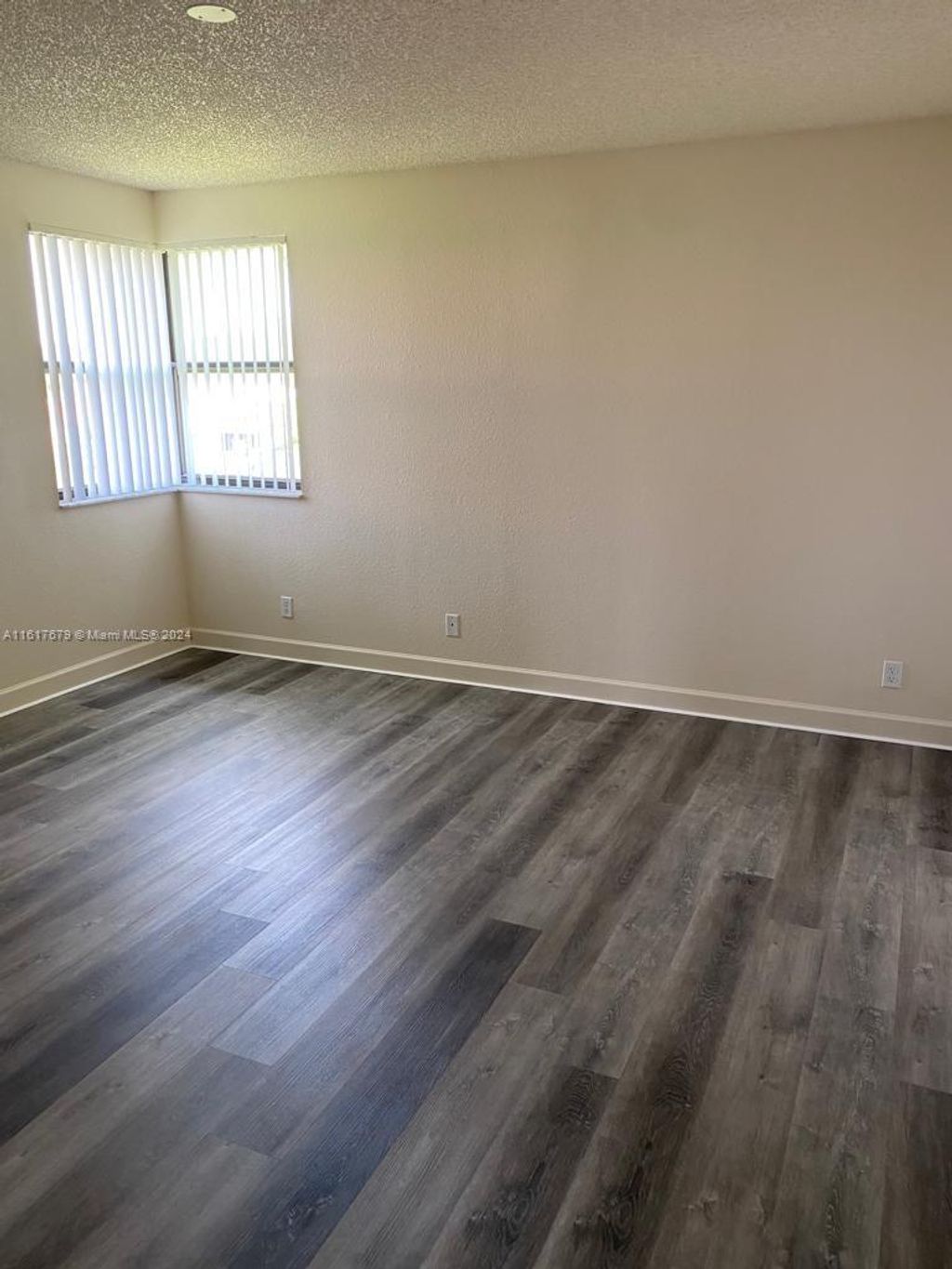 Photo of 10111 W Sunrise Blvd #301, Plantation, FL 33322 (MLS # A11617679)