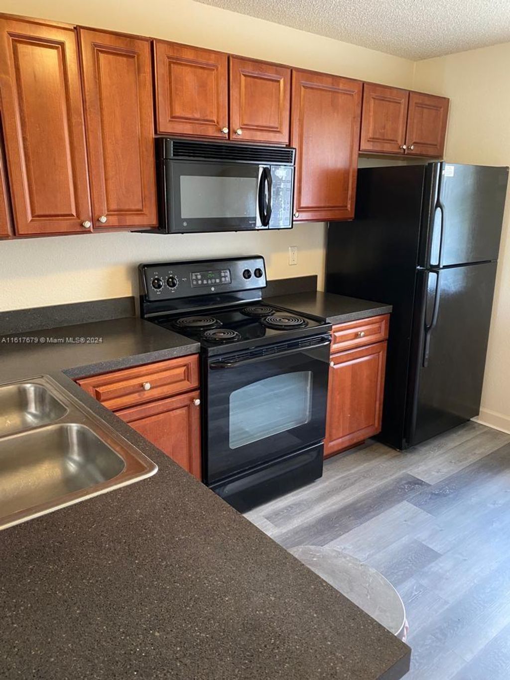 Photo of 10111 W Sunrise Blvd #301, Plantation, FL 33322 (MLS # A11617679)