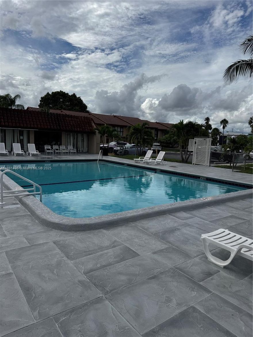 Comfortable, Cozy and Spacious close  to community pool. This home has a complete windows and doors Shutter, recently replaced Washer/Dryer, , separate laundry/utility room, and LOTS of closet space. Zoned for good schools. Conveniently located near places of worship, stores, restaurants, Hard Rock Casino, Fort Lauderdale Airport, and more. Community offers a pool, club house, kids playground, basketball and tennis courts. Just a perfect place to raise a family.