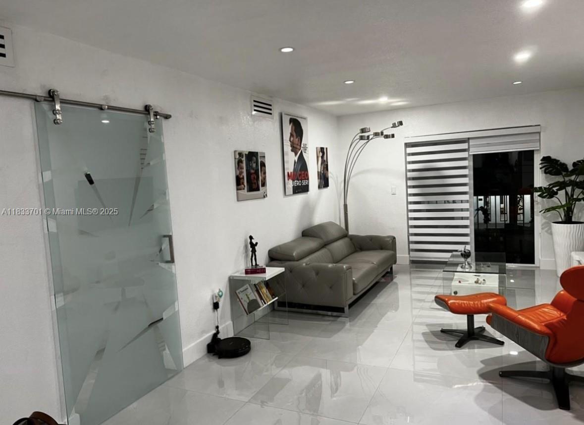 Fully remodeled 2-bedroom apartment with high-end finishes, stainless steel appliances and a spacious balcony. Located in the heart of Miami Lakes, this move-in ready unit includes water in the monthly rent. Features include two assigned parking spaces, plenty of visitor parking and access to a pool. Conveniently situated near essential services, shops, and restaurants, offering both comfort and accessibility.
