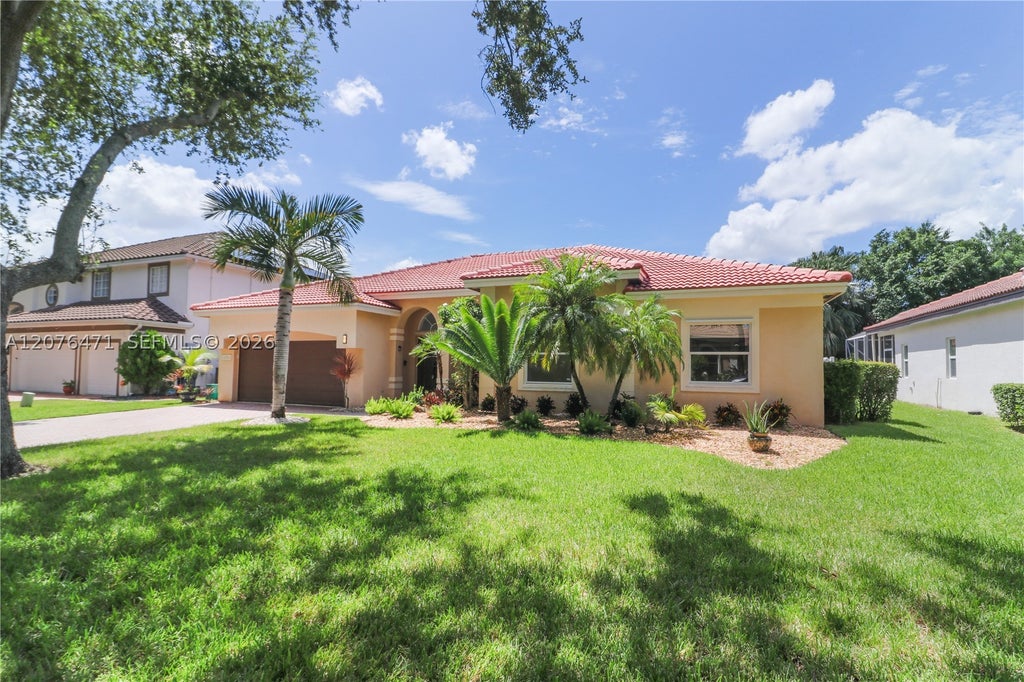 Photo of 10256 NW 53rd Ct, Coral Springs, FL 33076 (MLS # A12076471)