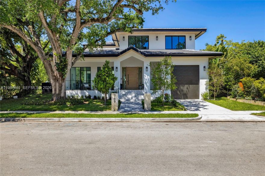 This isn’t your typical new construction—this is a home designed to feel timeless from day one. Welcome to Majestic Oak Manor, a newly completed 2026 residence in gated Belle Meade offering 4,210 SF under air and over 6,998 SF of indoor-outdoor spaces, including terraces, patios, pool and garage. Intentionally designed to honor its setting, this residence blends refined modern living with a sense of permanence and architectural depth rarely found in new construction. Enter through a sprawling covered front porch, framed by a relocated 100-year old majestic oak, into a dramatic entry vestibule defined by a floating ceiling and curated designer lighting—an arrival that is both striking and serene. The home features five en-suite bedrooms, including a stunning primary suite with spa-style wet room, soaking tub, dual showers, expansive walk-in closet and terrace. A chef’s kitchen with Fisher & Paykel appliances, an oversized island, and a generous walk-in pantry anchors grand yet inviting living spaces that unfold through a full wall of glass to a covered terrace with outdoor kitchen, dining, and lounge areas. A 52-ft resort-style pool—among the largest in Belle Meade—anchors the lush, tropical private grounds. Elevated above the FEMA flood line and finished with 8-foot trim-less doors, floating walls, a garage with lift, A/C storage, guest powder room, and full cabana bath. A rare offering where design, scale, and soul converge—Majestic Oak Manor stands in a class of its own.