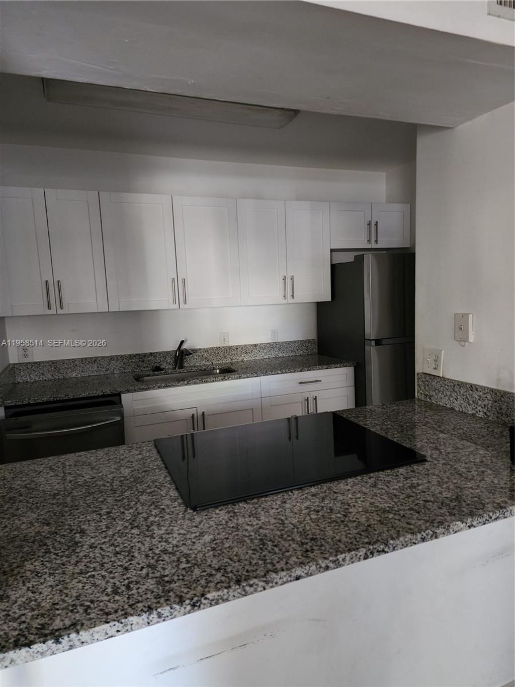 Photo of 4321 W Mcnab Rd #10, Pompano Beach, FL 33069 (MLS # A11958514)