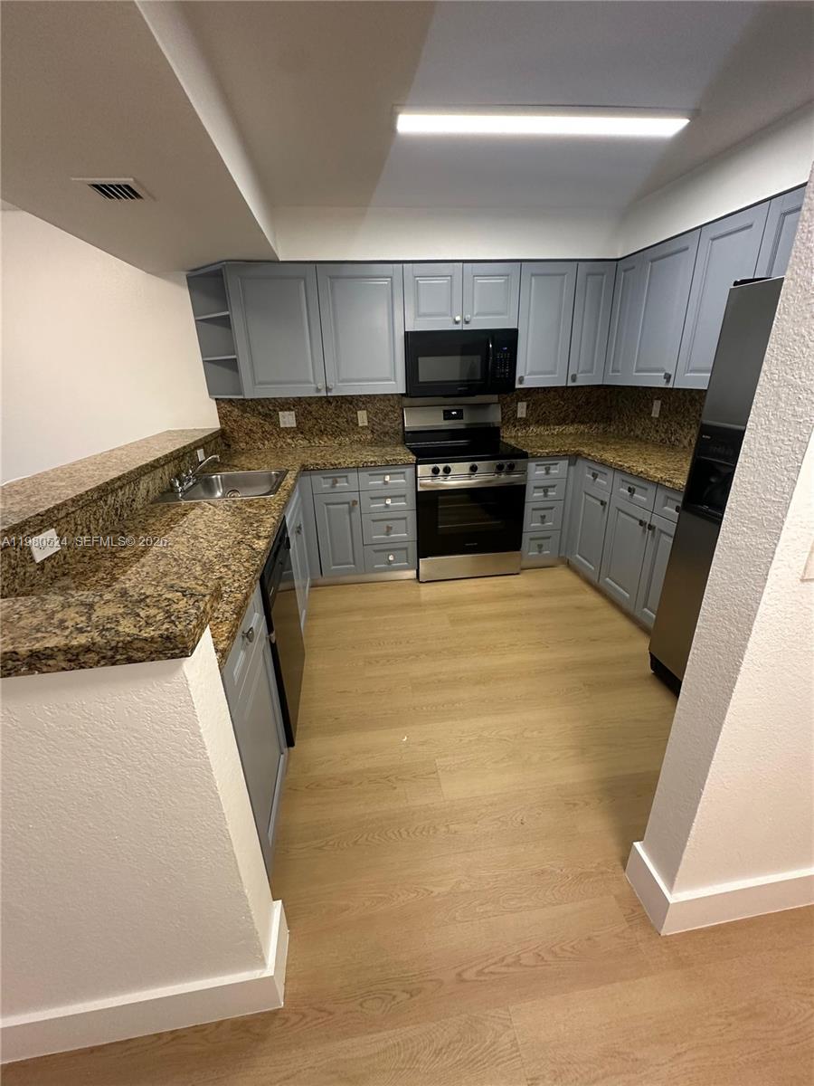 DORAL GARDENS II CONDO - Residential Lease