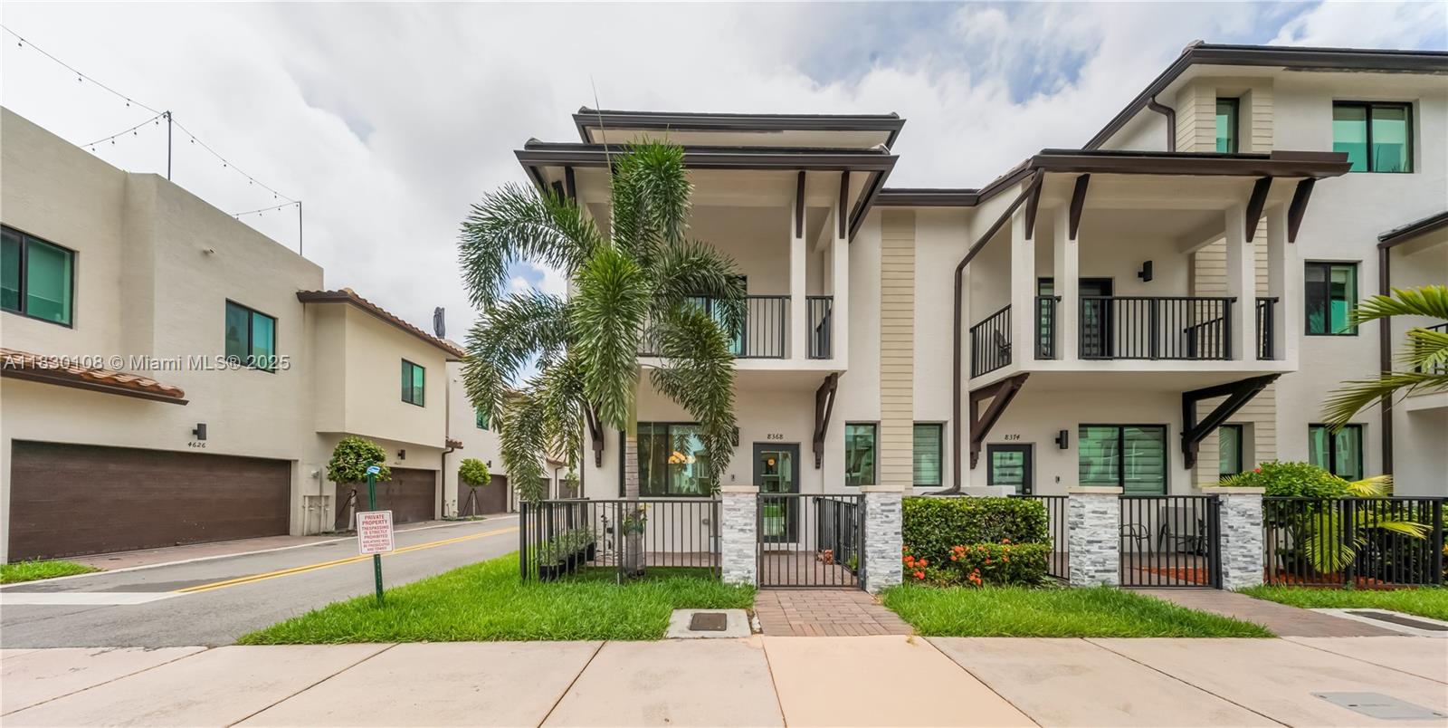 Welcome to this stunning 3-story townhouse in the heart of Doral, perfectly located across from Central Park! Featuring 3 spacious bedrooms, 2 full baths & 2 half baths, this smart home sits on a premium corner lot with a 2-car garage. Enjoy custom kitchen cabinets, fully wired alarm system, fans in every bedroom, 2 A/C units, tankless water heaters and WiFI extenders on every floor for seamless connectivity. The 3rd floor skyview terrace includes a stainless steel kitchen, cozy sitting area and lake view ideal for entertaining or relaxing. Residents enjoy resort-style amenities: Pool, BBQ area, clubhouse, game room, splash park, fitness center, indoor track and basketball courts. Steps from downtown Doral, schools, parks and entertainment, this home offers a vibrant, walkable lifestyle.