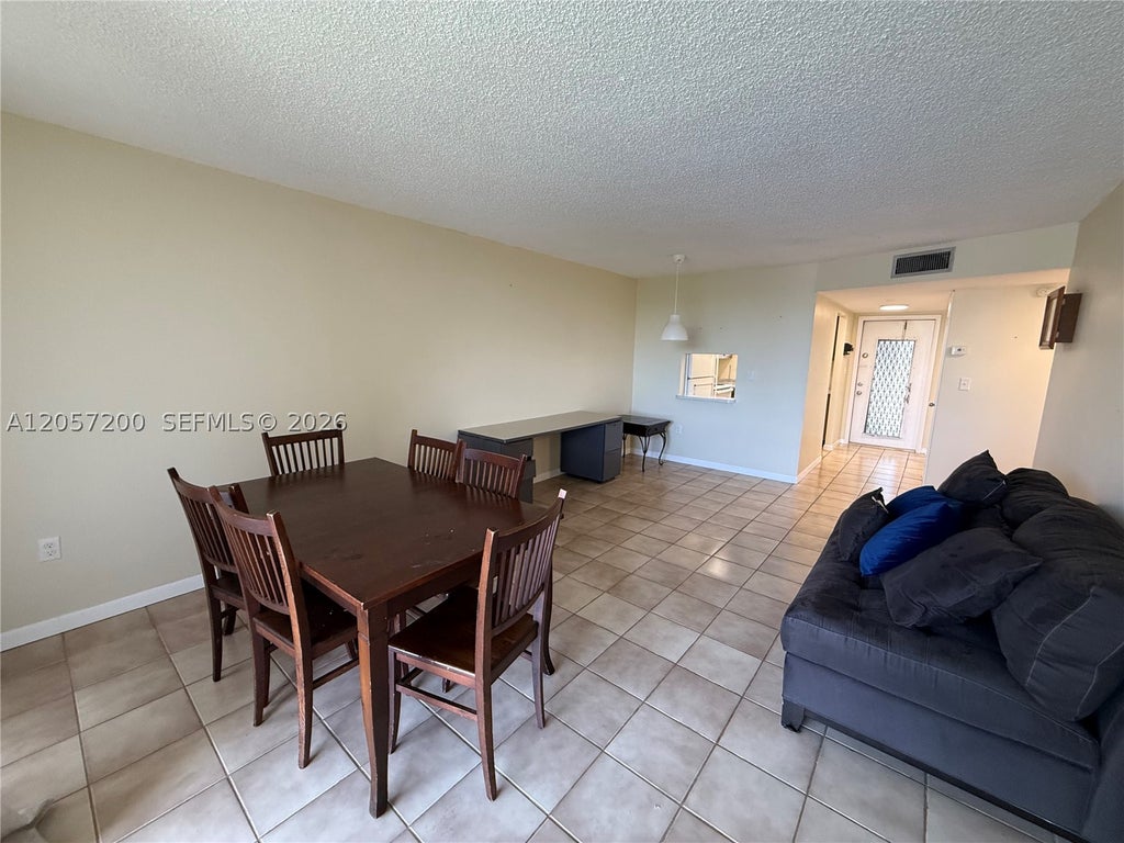 Photo of 8305 Sunrise Lakes Blvd #201, Sunrise, FL 33322 (MLS # A12057200)