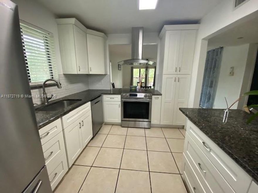Substantially renovated 2/2 corner unit at Racquet Club in prestigious Weston where living and landscaping is upscale with a safe serene environment.  Updated Kitchen with SS appliances and Hood System!  Updated bathrooms.  Full size Washer and Dryer in separate space, not inside bathroom and kitchen.  View of pool area and garden from 2nd fl.  Reserved parking in front of building.  Great school district!  Walk and bike ride around the lush surroundings.  Membership to Bonaventure Town Center Club with all amenities - club, new gym, remodeled pool, hair salon, tennis and pickelball courts, dance, exercise rooms, basketball court, bowling alley, movie theatre, etc.  Association fees include insurance and other expenses.  Association approval required.  Take a look and make an offer!