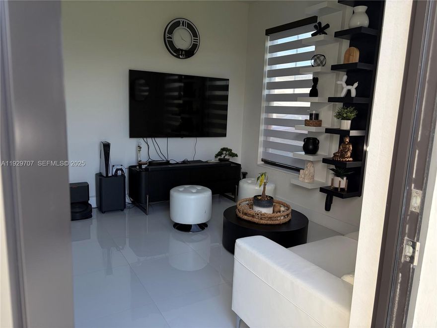 Experience refined living at its finest in this exclusive Homestead residence at 32308 SW 196 Ave — a private luxury retreat masterfully upgraded for those who demand elegance and comfort. From the moment you enter, you’re welcomed by sleek porcelain flooring, impeccable craftsmanship, and an atmosphere designed for upscale living.
The gourmet kitchen showcases designer quartz countertops, premium finishes, and a layout meant for both style and function. Every detail has been thoughtfully curated — including luxury porcelain bathroom upgrades, impact windows & doors, and a sophisticated metallic perimeter fence that enhances the estate-like feel of the property.
Perfect for multi-generational living or high-end rental flexibility, the home includes a fully equipped attached apartment with its own private appeal. Outdoor areas offer generous space for entertaining, future amenities, or tranquil relaxation surrounded by privacy.

Modern elegance, exceptional quality, and unmatched versatility — this is luxury living in Homestead at its best.