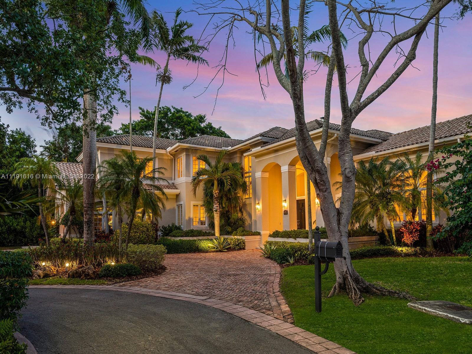 Majestic Two-story estate located on a quiet cul-de-sac in the gated community of Cutler Oaks Estates. This elegant home welcomes you w/ a grand foyer, volume ceilings & gorgeous wrap around staircase all while offering an expansive flr plan featuring a spectacular formal living rm w/ fireplace & huge imp win/drs. Discover a formal dining rm leading to butler’s pantry & gourmet kit w/ walk-in pantry & breakfast area. Spacious family rm w/ custom wet-bar. Private master suite on the second level w/ sitting area, resort-style bath & gym/office rm w/ spiral staircase leading to the outdrs. A backyd oasis awaits w/ swimming pool/spa, built-in summer kit, covered terr & natural hammock leading to private dock. Add’l Features: upstairs den, en-suite bedrms, laundry rm, & 2 Car gar.