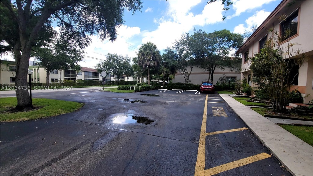 Photo of 9092 NW 40th St #4, Coral Springs, FL 33065 (MLS # A12064736)